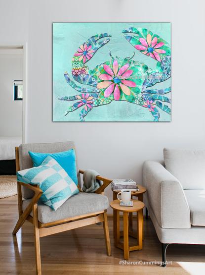 Blue and pink daisy crab design art by artist Sharon cummings.  Set in a furniture setting.