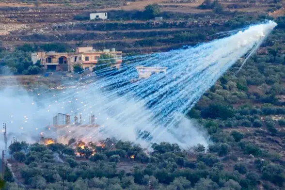 White phosphorus munitions ignite when exposed to oxygen at temperatures above 30 Celsius (86 Fahrenheit) and rain down streaks of dense white smoke mixed with phosphorus oxides.
The fiery fragments continue to burn – on vegetation, buildings, or right through human flesh – until they are fully oxidised or deprived of oxygen.