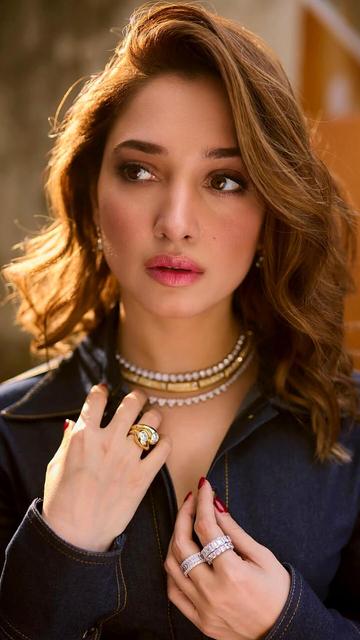 Tamannaah redefines fashion goals in a bold blue bodycon dress. The stunning outfit hugs her curves perfectly, highlighting her impeccable taste in style. A must-see look for all fashion enthusiasts!