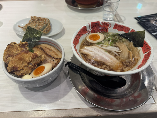 Ramen and rice bowl with fried chicken topping 