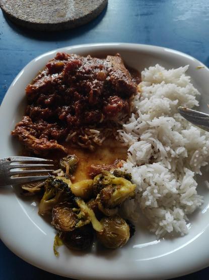 Foto of home made food as described in the post. White plate on blue table.