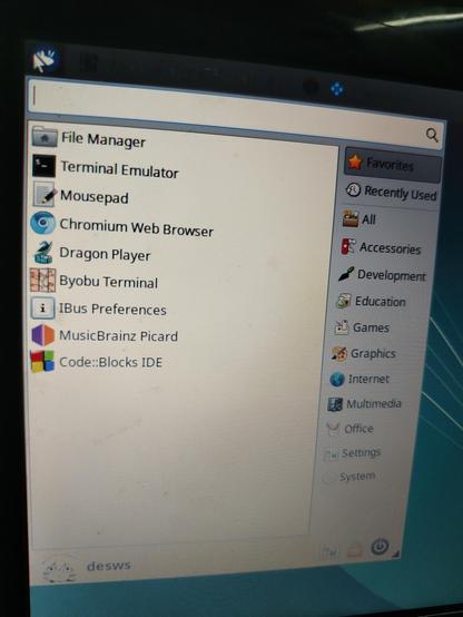 An old laptop running Xubuntu.
Xubuntu program menu appears.