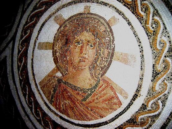 Apollo Sol with seven-pointed gloriole of Helios, Roman floor mosaic, Tunisia, late 2nd century. Source: Wikimedia Commonsꜛ (license: public domain).