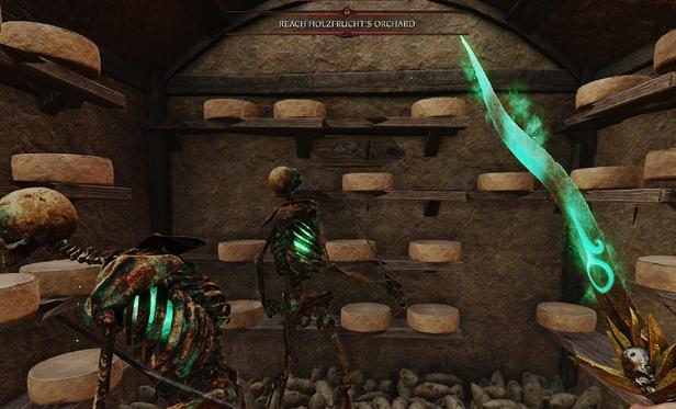 This image shows a dimly lit cellar with wooden shelves lined with wheels of cheese. On the dirt floor below the shelves are scattered potatoes. Two glowing green skeletons stand in the foreground, one wielding a sword. To the right, a glowing ethereal blade with intricate designs is visible, held by an unseen character. 
