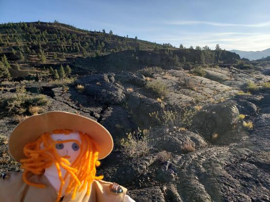 Ranger Sarah looks at a Pressure Ridge. Pressure ridges are a common feature of pahoehoe flows.
— at Craters of the Moon NPS.