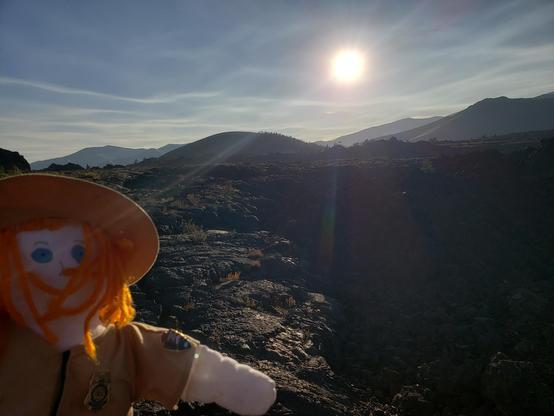 Ranger Sarah looks out at the vast lava field. Pahoehoe is the most common type of lava flow found at Craters of the Moon.
— at Craters of the Moon NPS.
