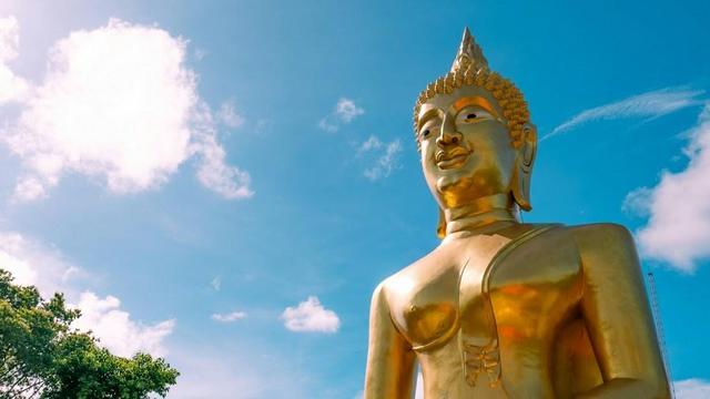 Giant gold Buddha statue.