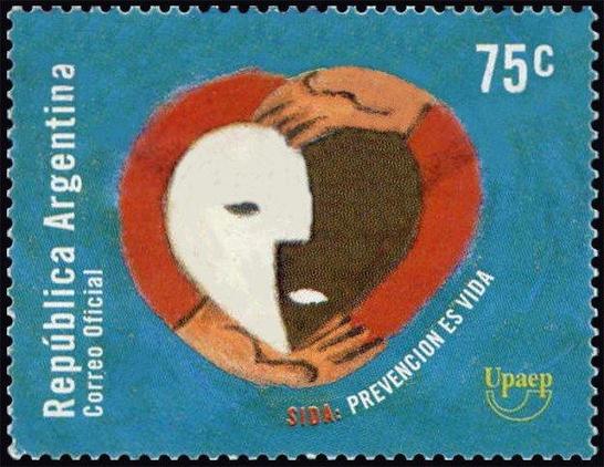 AIDS awareness postage stamp featuring two stylized black and white faces in the shape of a heart surrounded by a pair of arms.