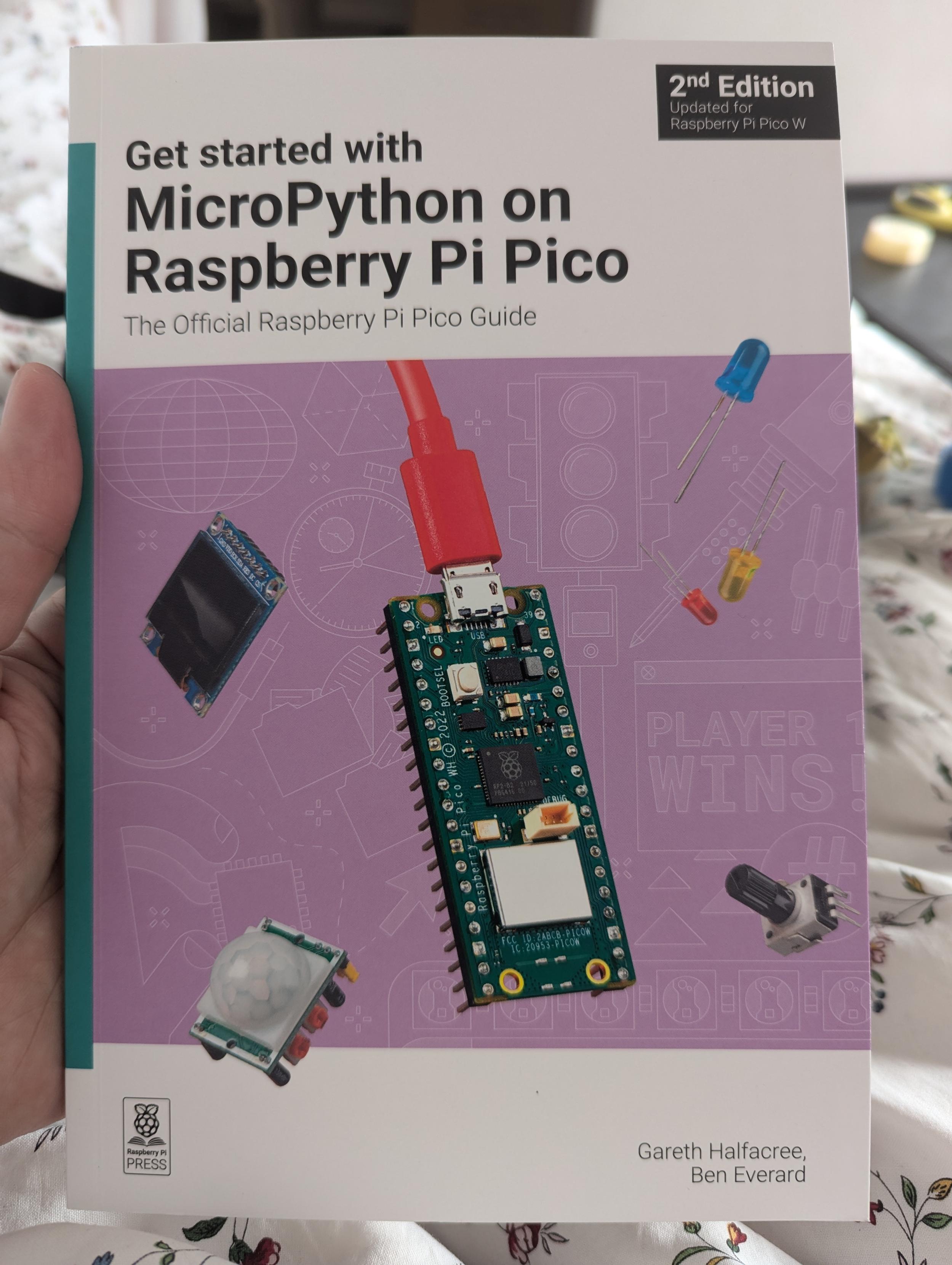 Front cover of the book 
Get started with micro python on raspberry pi Pico. 

It has a sketch of a pi Pico on the front