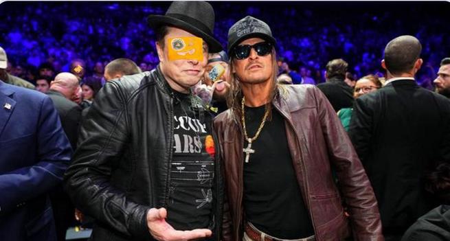 Elon Musk and Kid Rock pose at some stupid GOP fake wrestling event. They both look like dog shit that has baked in the sun for several days, only the dog shit is wearing stupid hats, leather jackets, and sunglasses.-- savage.