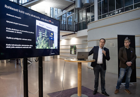 Jolla's Antti Saarnio (Chairman of the Board) and Sami Pienimäki (CEO) standing next to a large presentation monitor at the grand opening event of the Jolla AI factory at Salo IoT campus.

Turun Sanomat - KIRSI-MAARIT VENETPALO
