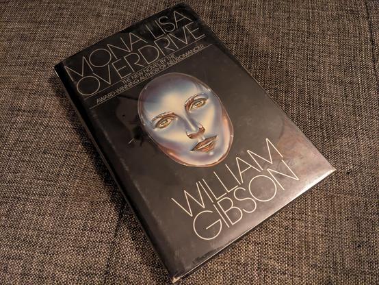 First printing of William Gibson's 1988 "Mona Lisa Overdrive," the third of the cyberpunk #Sprawl trilogy that helped first define this genre in the early 1980s. On its own, I'll list it at eBay for $30 just in case I get a taker, would accept up to $15, and with a resale value of only about $10; if I get first printings of the entire trilogy, then you're talking maybe $100 to 150 at eBay; $500 if all are signed too. More importantly for me, though, if I manage to live to 100 (no reason I wouldn't), I can just hold on to this patiently for another 50 years, and the trilogy at that point will be worth major dollars, probably a thousand or more even for unsigned. As a low-budget rare book collector, I mostly specialize in things you can still find at yard sales and used bookstores for $1 to 10 -- namely, Postmodernist novelists of the 1970s, '80s and '90s, especially women and people of color; '90s and '00s culture books on cyberpunk, Generation X, slam poetry, early web design, etc.; and hypermodern stuff people aren't even thinking of collecting yet (like the first printing I own of the "I Can Has Cheezburger?" paperback). If I collect it now when it's in pristine condition, then quietly store it on a shaded bookcase for the next 50 years, all of that stuff will be worth from the hundreds to the thousands per book.