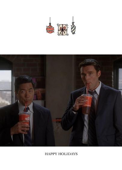 Kimball Cho and Wayne Rigsby, (Tim Kang and Owain Yeoman respectively) characters in The Mentalist drink soda using straws in a scene from the tv show.