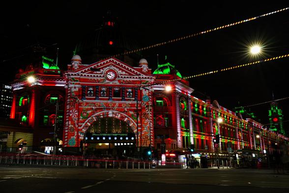Flinders Street Station, located in Melbourne, Victoria, is not just a railway station but an iconic landmark with a rich history. Opened on September 12, 1854, it was the first railway station built in any Australian city. Initially known as Melbourne Terminus, it started as a collection of weatherboard sheds.

Over the years, Flinders Street Station has undergone several transformations. The current building, designed by Fawcett and Ashworth, was the result of an architectural competition held in 1902. The station's distinctive Edwardian architecture, with its dome, tower, and clocks, has become a symbol of Melbourne.

By the 1920s, Flinders Street Station was reputedly the world's busiest passenger station, handling an astounding 200,000 passengers in a single day on January 11, 1922. The station's central location and extensive rail and tram connections have made it a vital hub for commuters.

Despite its age, Flinders Street Station remains a bustling center of activity, with millions of passengers passing through its gates each year. It continues to be a meeting place and a cultural icon, celebrated for its architectural beauty and historical significance.
