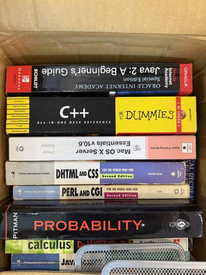 A stack of early 2000’s development books.