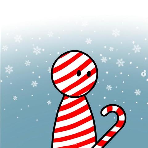 Viñeta de Dagsson: sobre un fondo festivo de copos de nieve puede verse el busto de un muñeco de caramelo rayado que observa, ligeramente estupefacto, un bastón de caramelo que emerge de alguna otra parte de su cuerpo que, por encontrarse más abajo, no es visible en la viñeta.
