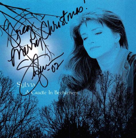 Sylvia's autograph to me wishing me Merry Christmas on her "A Cradle in Bethlehem" album cover from 2002.