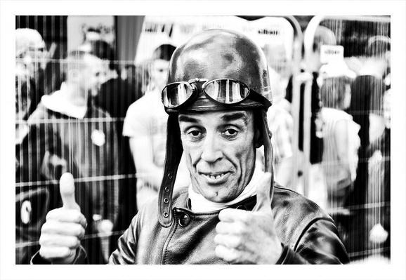 Testing consensus using Roman voting: a black-and-white photograph of a racehorse jockey displaying both thumbs up. Photo attribution: Flickr user vegaseddie.