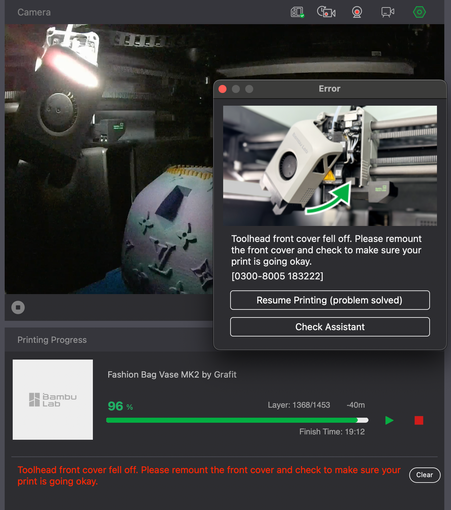A screenshot of Bambu Studio from my laptop. It’s shown that the print task needs 40 more mins, but it’s paused because of an error. The error pop-up shows: “Toolhead front cover fell off. Please remount the front cover and check to make sure your print is going okay.”