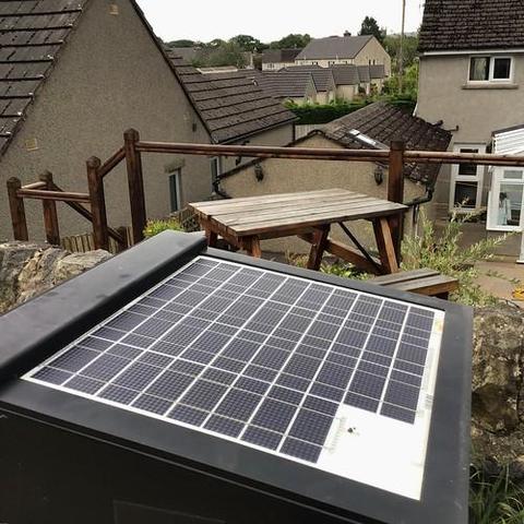 A photo titled "Grid of cells forming a solar panel near the canal towpath", taken near Lock 32, Higherland Lock by anthroview on Flickr.
