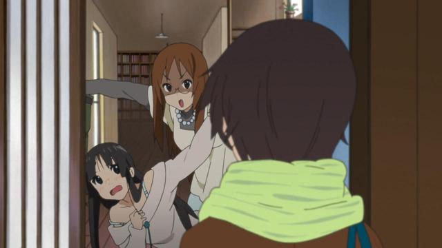 A woman (Sawako) with a determined face holding onto a girl (Mio) who appears scared while a different girl (Nodoka) looks at them from an open door.