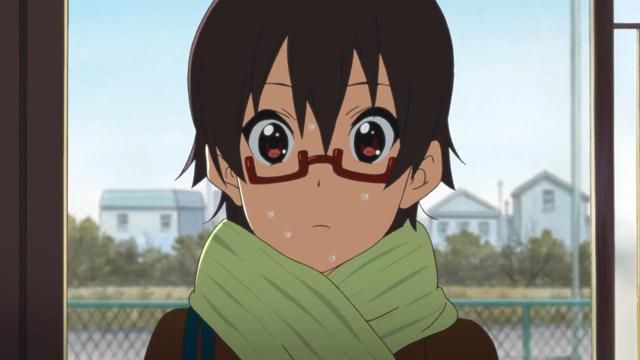 A girl (Nodoka) with a worried expression with sweat on her face.
