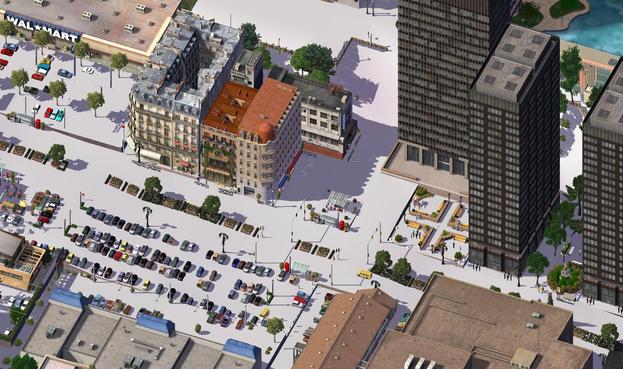 Screenshot of SimCity4, isometric. 
The streets are white with snow in an inner city borough, a mixture of Parisian and Mediterranean buildings overlooked by tall black office buildings 