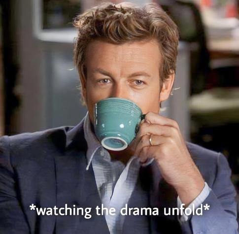 Patrick Jane of the Mentalist TV show drinks tea from his turquoise cup as he thinks “watching the drama unfold.” 