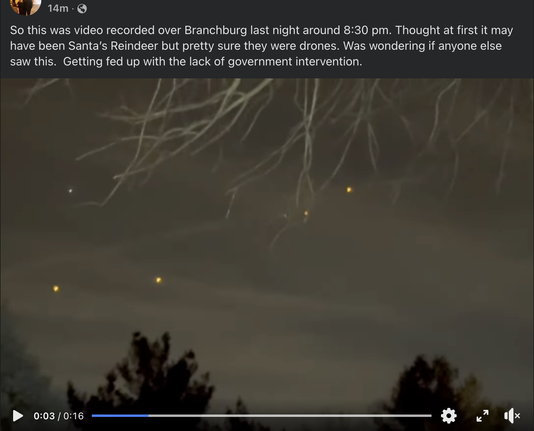 A formation of orange lights flying over NJ.