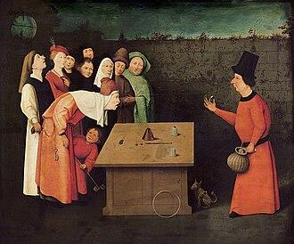 In Bosch's painting The Conjurer, the figure on the left steals an item from an audience member who is intently watching the performance of a magic trick
