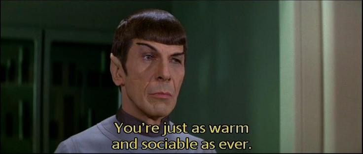 Scene from Star Trek The Motion Picture. Spock is standing and stoic as he usually does, intensely raising one eyebrow while otherwise displaying no emotion. Closed caption reads, "You're just as warm and sociable as ever." 