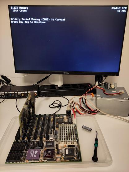 Soyo 386DX mainboard with a TI 486DLC CPU booting with Mr. BIOS, but erroring out on the BIOS screen, due to missing battery.