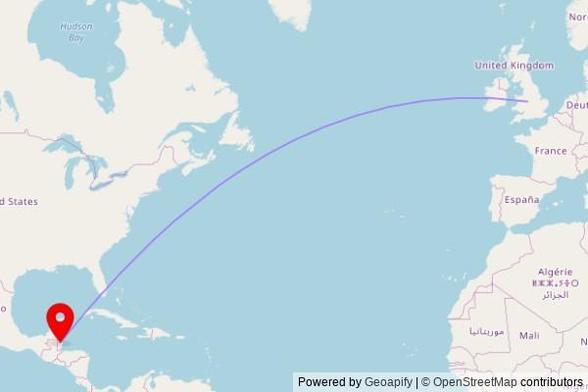 A map showing the great circle route from Cannock Chase in the United Kingdom to a map pin at Lusyvida Family of God Church, George Price Highway, Cotton Tree, Belize