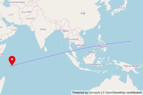 A map showing the great circle route from Tamuning in the United States to a map pin at St. Paul's Cathedral, Royal Street, Victoria, Seychelles