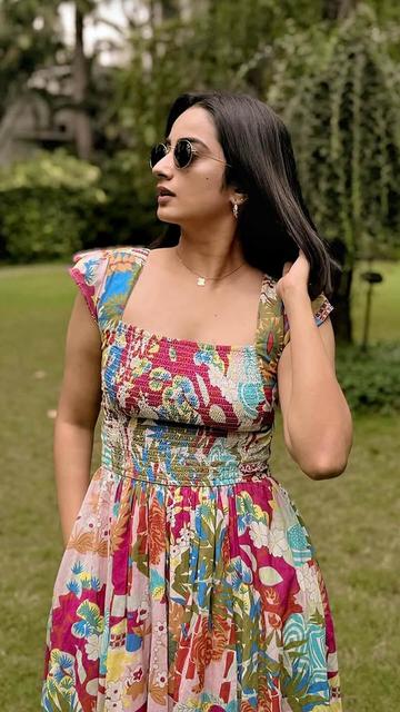 Steal the spotlight this festive season with Namitha Pramod’s floral midi dress. Its intricate floral design, flowing silhouette, and festive charm make it a standout choice for anyone looking to dazzle in style.