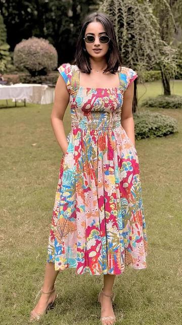 Festive florals never looked better! Namitha Pramod’s stunning midi dress showcases the perfect blend of modern trends and timeless elegance. Learn how she styled it effortlessly.