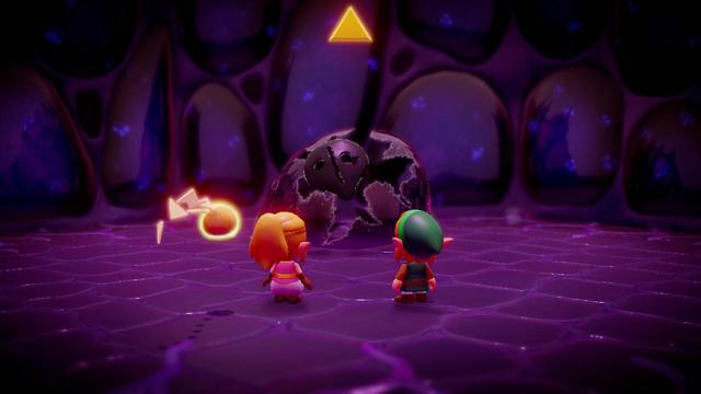 Playmobil-like Link and Zelda staring at a triforce element. Link's presence is a bit more than "please save me", but only a bit...