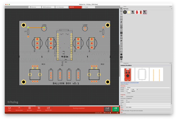 A circuit board layout diagram in the Fritzing design software. Spaces for components such as switches, LEDs, and resistors are arranged on a gray rectangle.