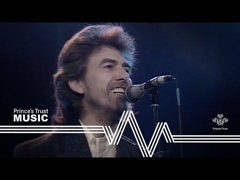 YouTube thumbnail image from the video, "George Harrison & Ringo Starr - While My Guitar Gently Weeps (The Prince's Trust Rock Gala 1987)" - https://www.youtube.com/watch?v=XzSrShbqlz8

Pictured is a head shot of George Harrison singing the song "While My Guitar Gently Weeps".