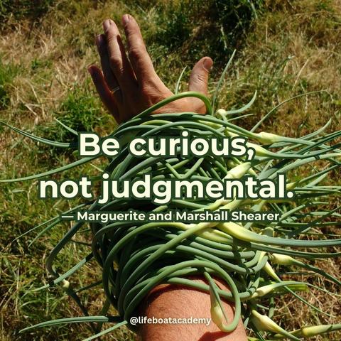 “Be curious, not judgmental.” — Marguerite and Marshall Shearer
@lifeboatacademy
Against a grassy background, between a naked forearm and a dirty hand, a dozens garlic scapes being worn like bangles. 