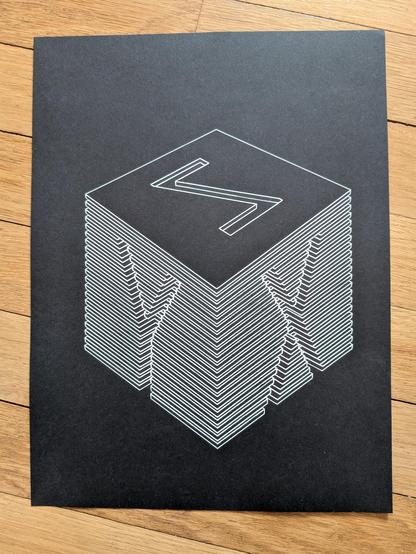 3D printer test cube (labeled x, y, and z on the three visible sides) sliced into cross sections and arranged back into an isometric view. Pen plotted with white ink on black paper.