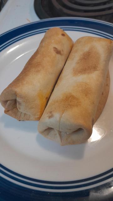 Two burritos on a plate