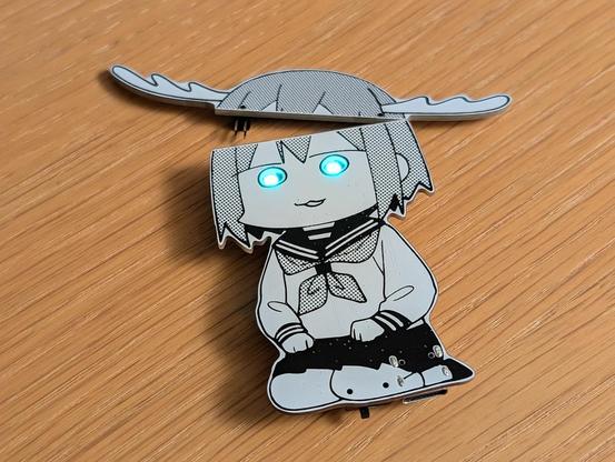 PCB with Shikanoko Noko print with detached non-illuminated antlers, eyes are glowing blue-greenish