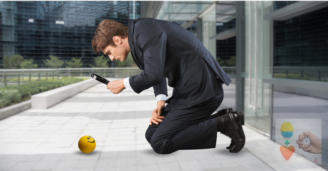 Branded art for my free weekly newsletter. Background is a sidewalk in an office complex. Foreground is a stock image of a man using a magnifying glass to look closely at a small yellow smiley face ball lying on the pavement. 