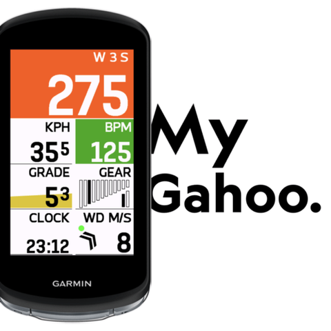 A Garmin Edge cycling computer display showing a data field layout similar to Wahoo's design. The screen shows various metrics including speed (27.5 KPH), heart rate (125 BPM), grade (3.5%), gear position (graphically displayed), clock (23:12), and other cycling data. The layout uses distinct color blocks with white text for clear visibility. Next to the device is text reading 'My Gahoo.'