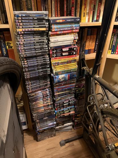 A stack of DVDs approximately 200 in number. 