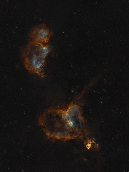 An interstellar gas cloud in the shape of a heart. It consists mainly out of hydrogen and oxygen, which signals are colored in red/orange (hydrogen) and blue/green (oxygen)