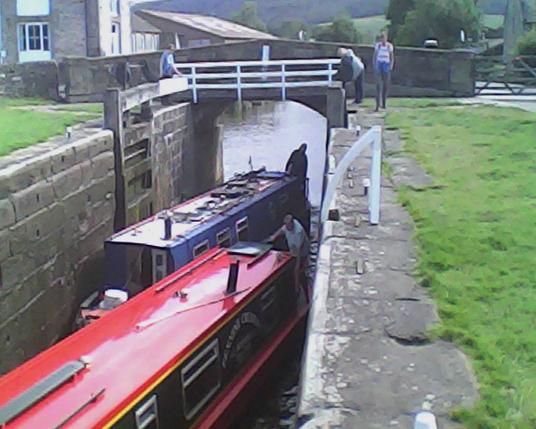 A photo titled "Two boats in the lock at the same time", taken near Lock 31, Eshton Road Lock by anthroview on Flickr.