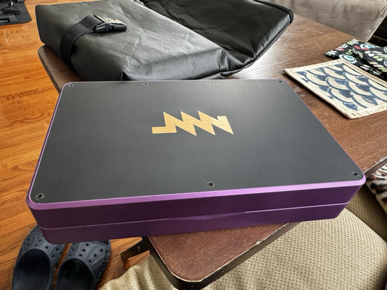 Purple MNT Pocket Reform, closed with MNT logo visible.