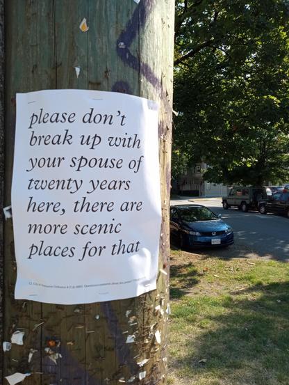 poster on telephone pole reading: 'please don't break up with your spouse of twenty years here, there are more scenic places for that'